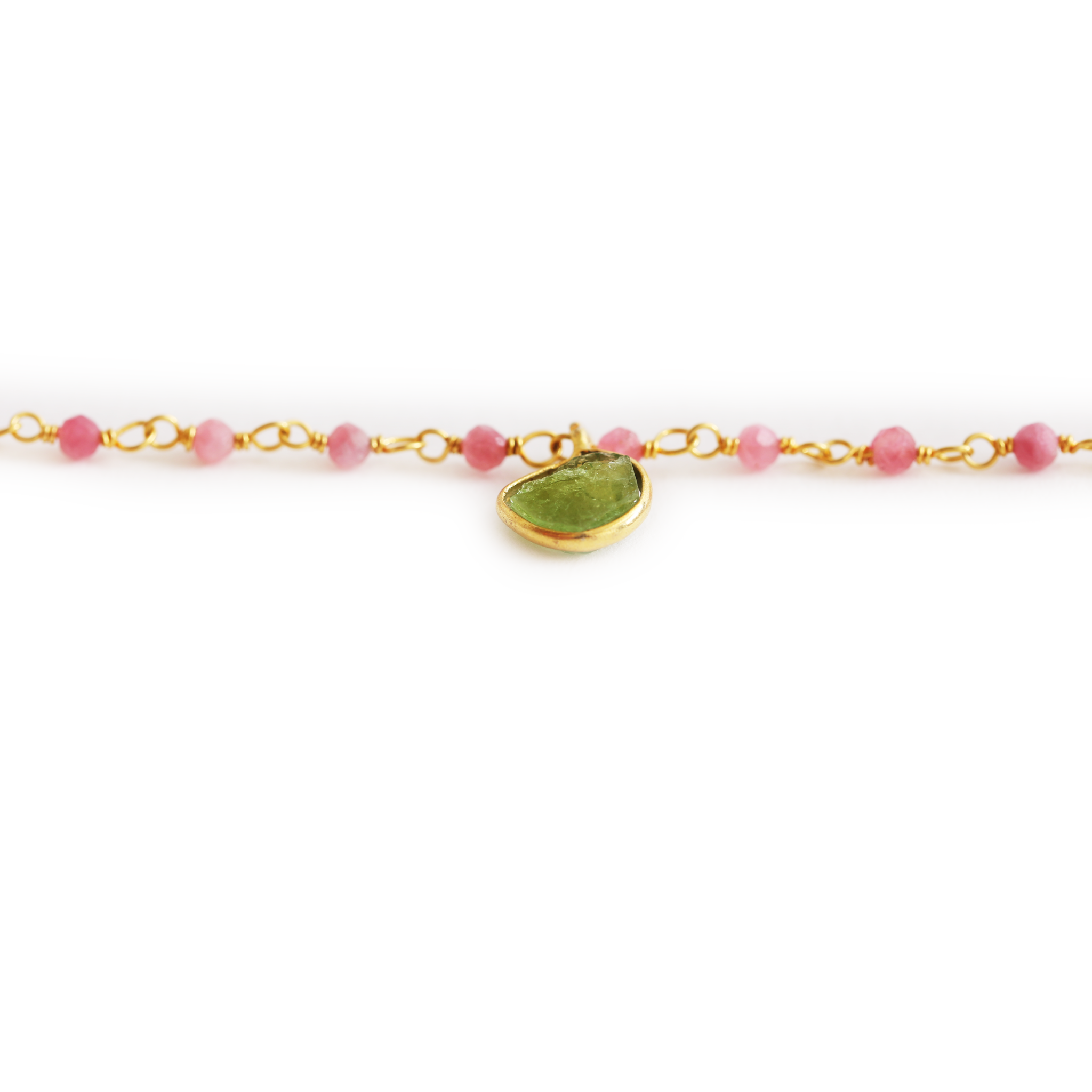 Pink Tourmaline beads and a Peridot
