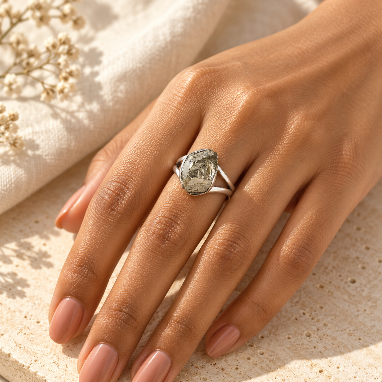 Pyrite Ring worn on a manicured hand